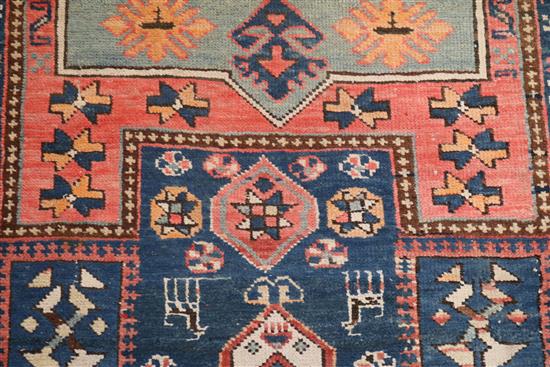 A Shirvan blue ground runner, c.1900, 15ft 6in by 3ft 7in.